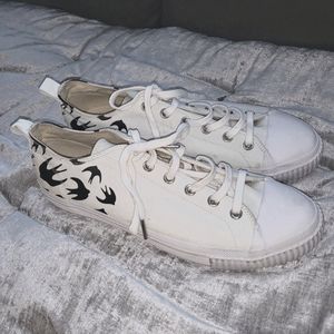 Alexander McQueen Swallow pattern low top canvas sneakers
